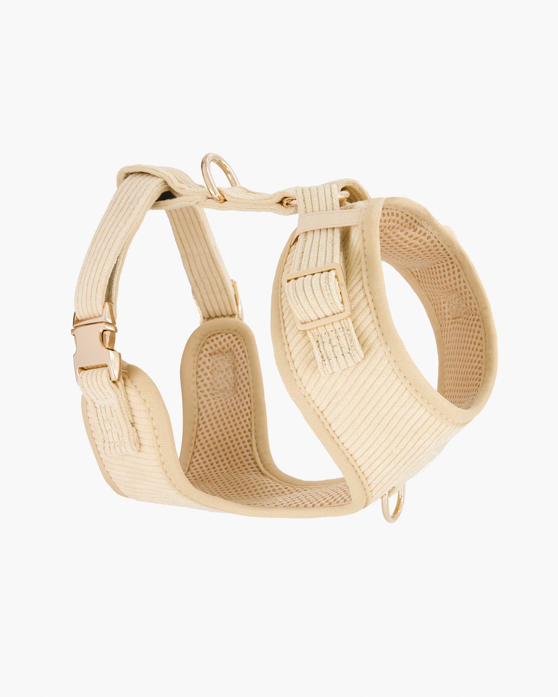 Side view of the Fetch and Bark Corduroy Harness in Cream, highlighting the luxurious corduroy texture, adjustable straps, and gold hardware for a comfortable and stylish fit