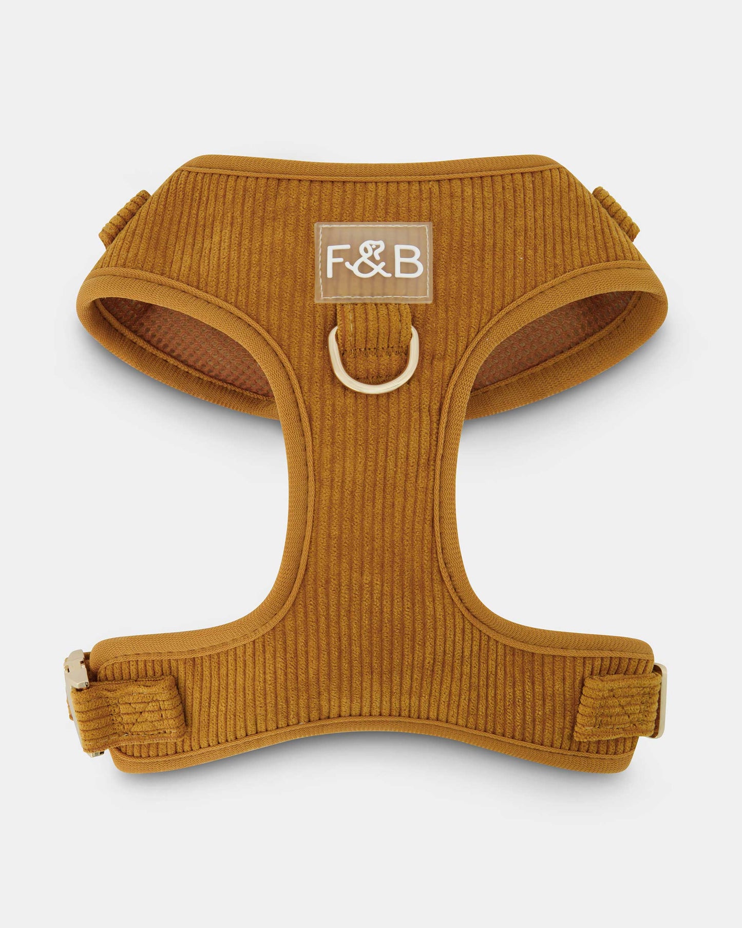 Front view of the Fetch and Bark Corduroy Harness in Ochre, showcasing the elegant corduroy texture and our signature Fetch and Bark logo at the center for a stylish and secure fit for dogs.