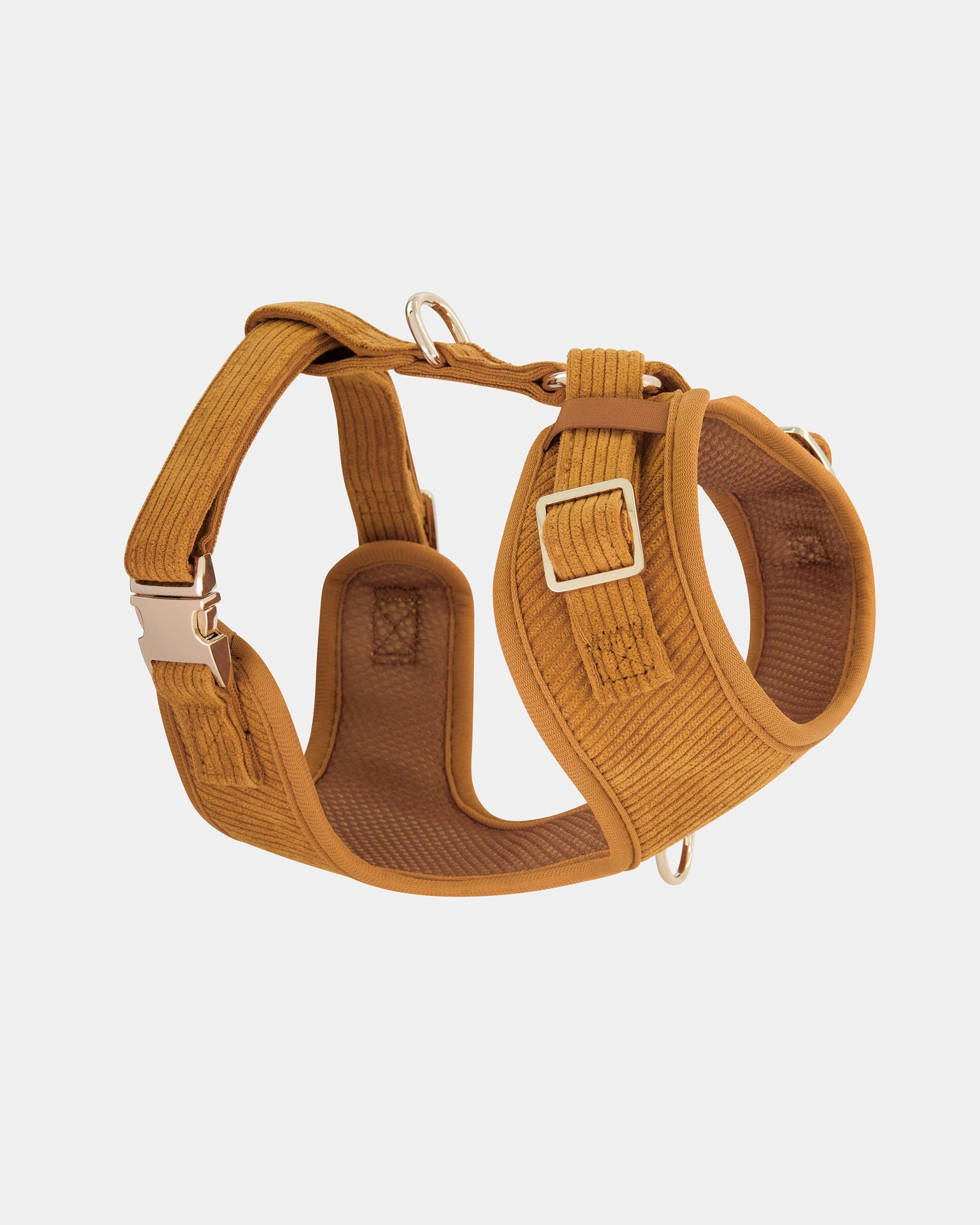 Side view of the Fetch and Bark Corduroy Harness in Ochre, highlighting the luxurious corduroy texture, adjustable straps, and gold hardware for a comfortable and stylish fit.